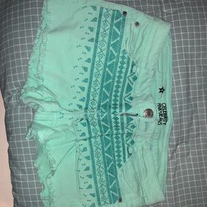 Teal with embroidered front jean shorts